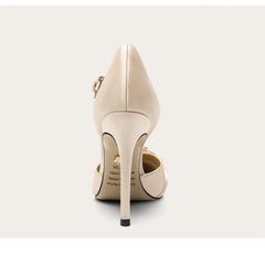 Beige high-heeled shoes on a white background