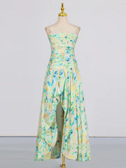 Floral strapless jumpsuit on a mannequin against a plain background