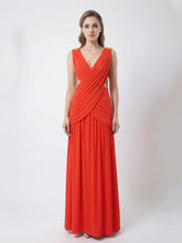 Woman wearing a red evening gown on a white background