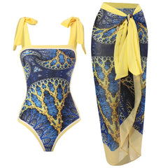Blue abstract print bikini set with tie straps and a matching wrap sarong.