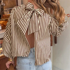 Striped tie back puff sleeve top detail