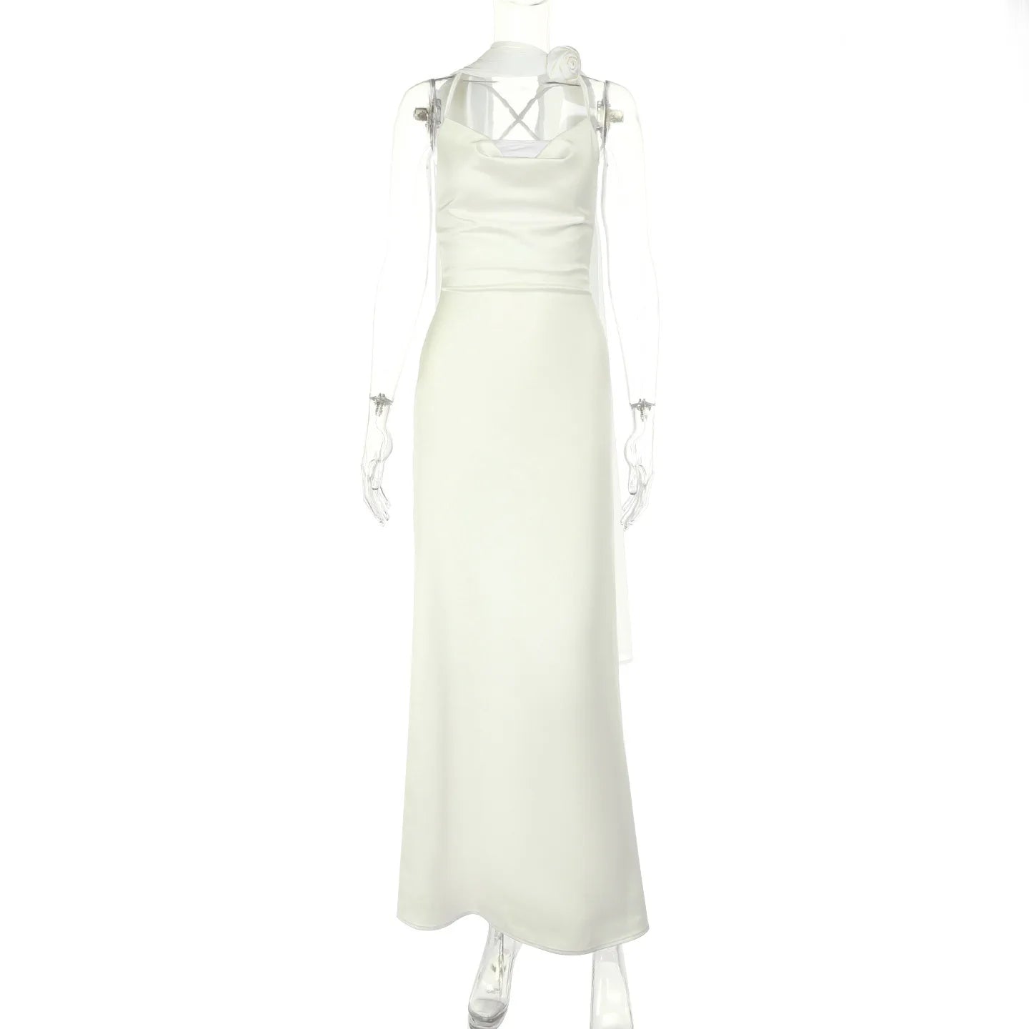White evening gown on a mannequin against a white background