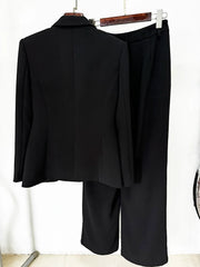 Back view of a black structured blazer and straight leg pants