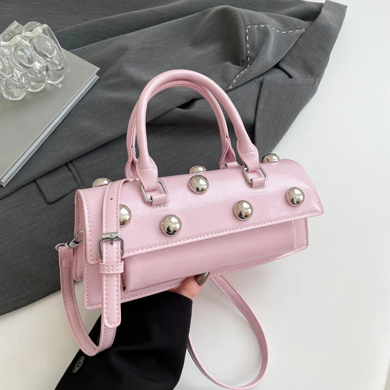 Pink riveted PU leather top handle bag