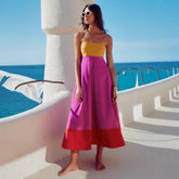 Contrast color strappy midi dress with defined waist and tiered hem