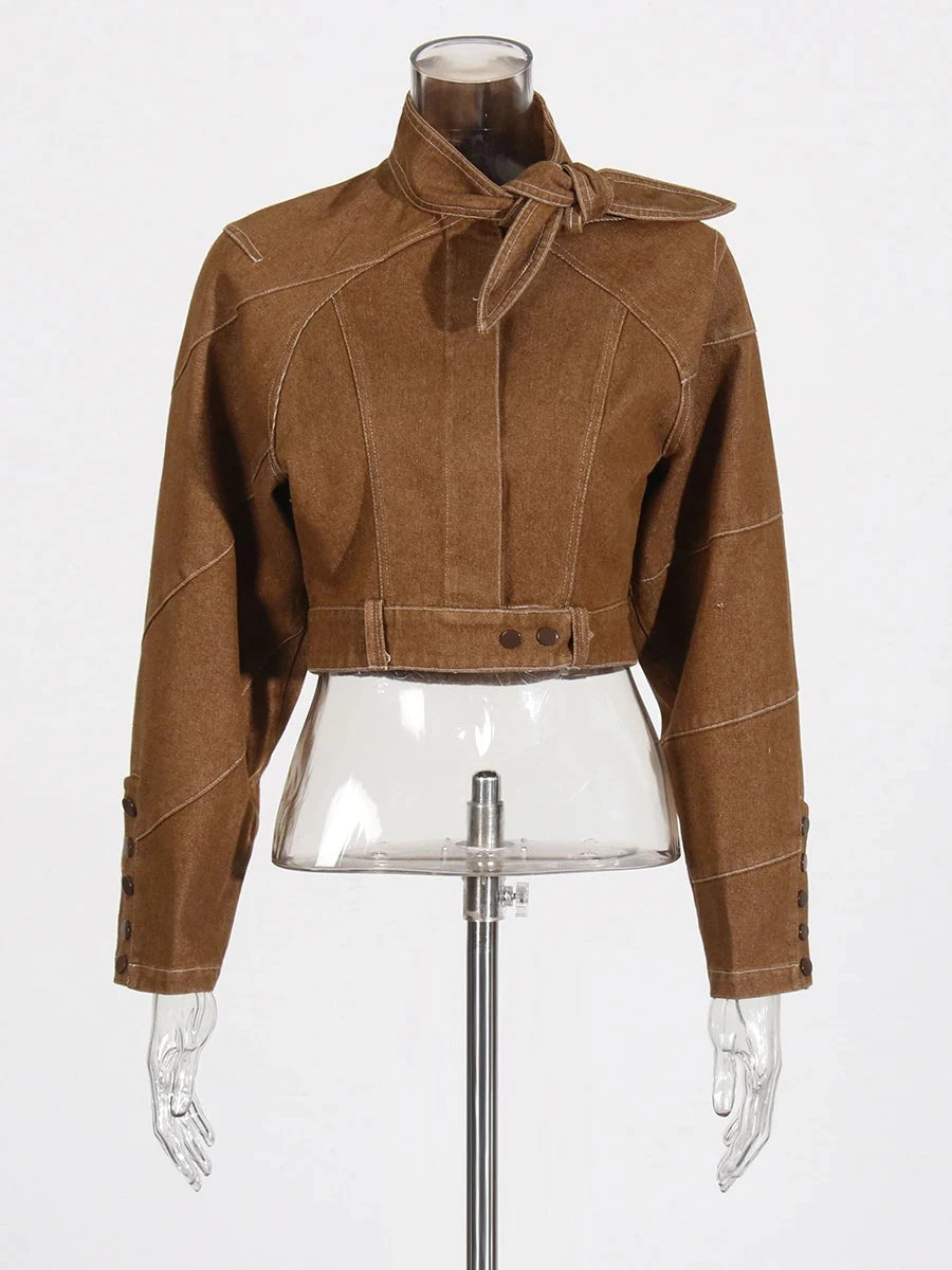 Brown jacket on a mannequin against a white background