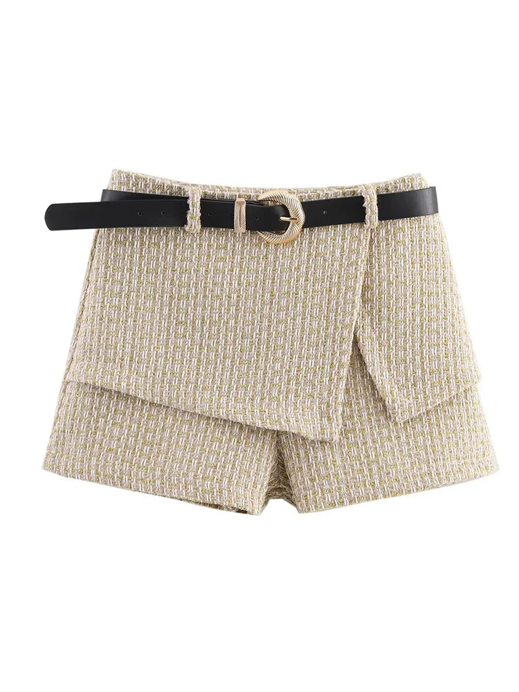 Beige shorts with a black belt on a white background
