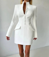 White blazer dress on a mannequin against a plain background