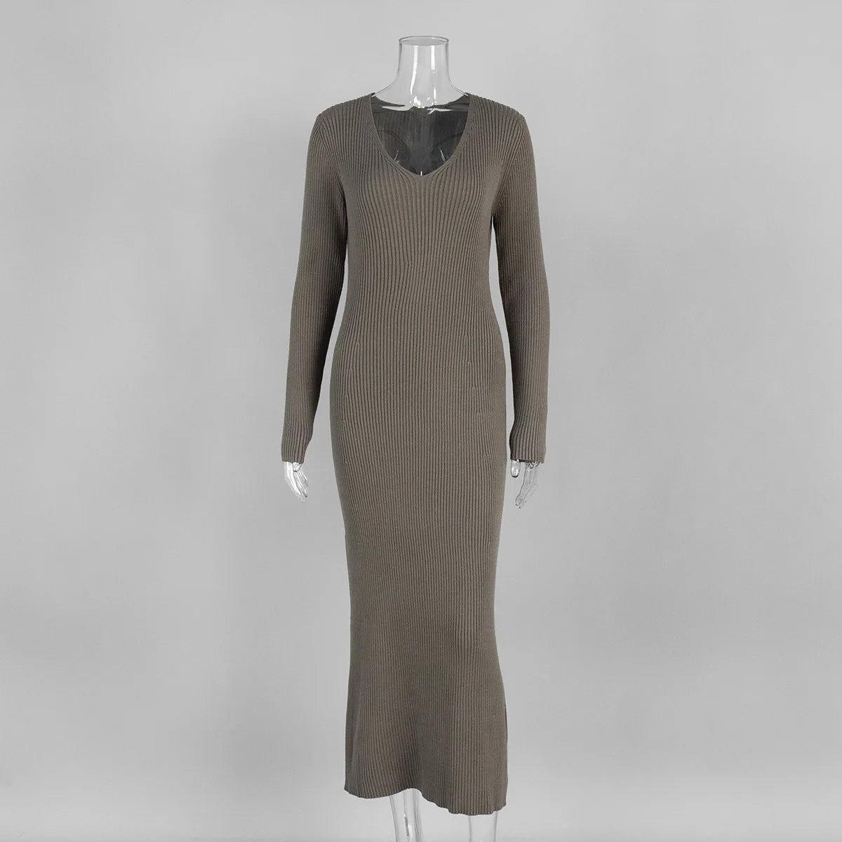 Brown ribbed dress on a mannequin against a gray background