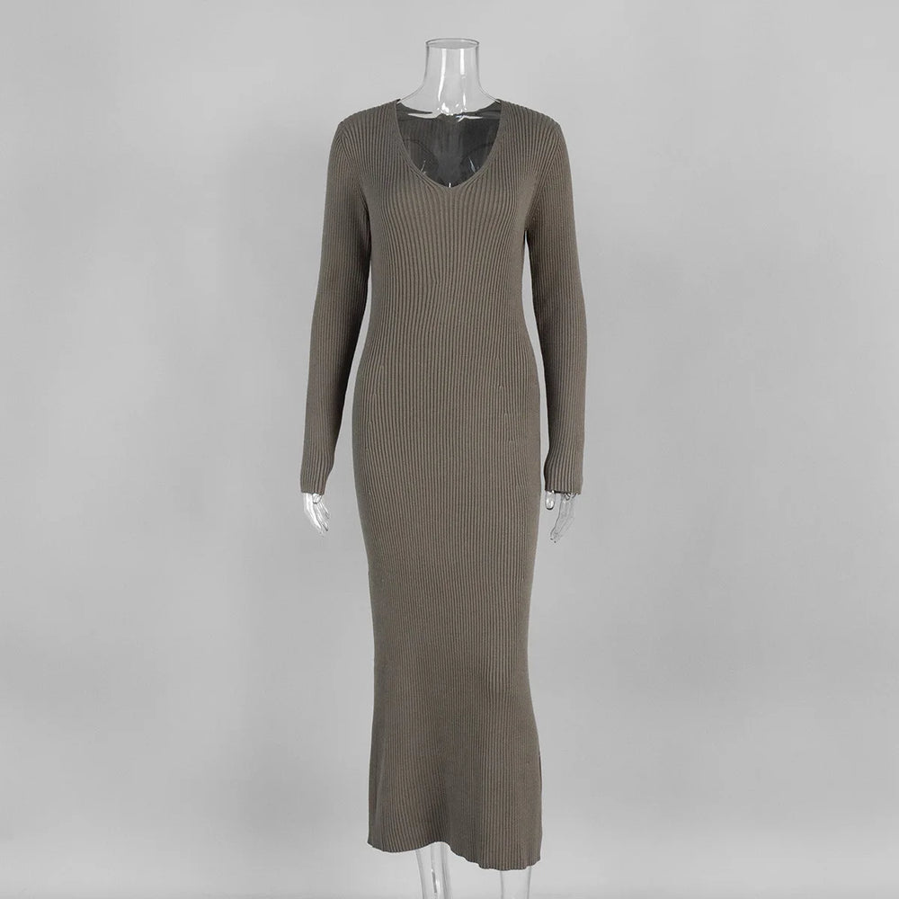 Brown ribbed dress on a mannequin against a gray background