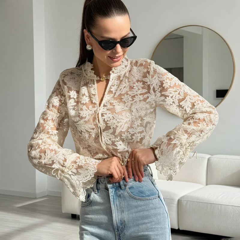 Sheer floral lace button-up top with flared cuffs