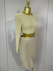 Beige mesh pearl top with matching midi bandage skirt set.