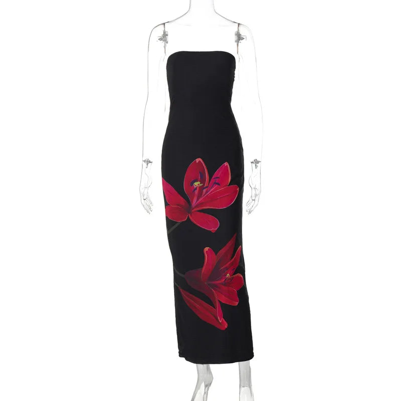 Black strapless dress with red floral designs on a mannequin