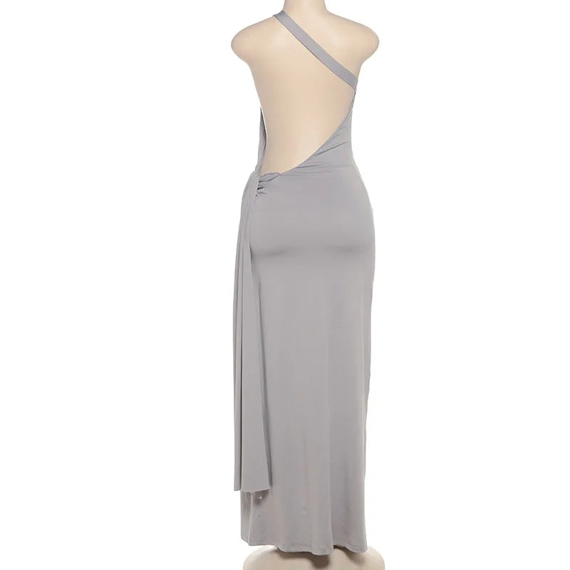 Gray evening gown on a mannequin against a white background