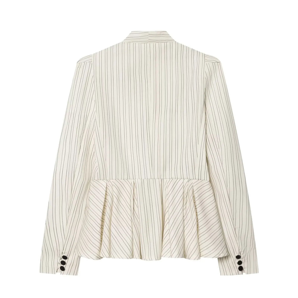 Striped blouse with ruffled bottom on a white background