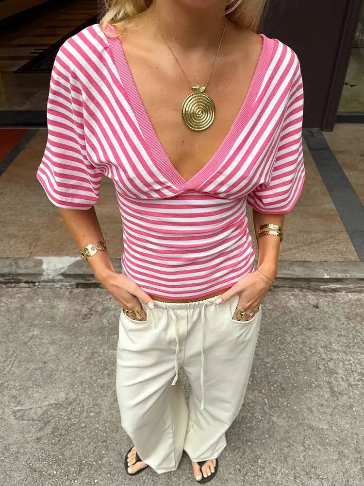 V-neck striped knit cropped top with dolman sleeves and ruched front