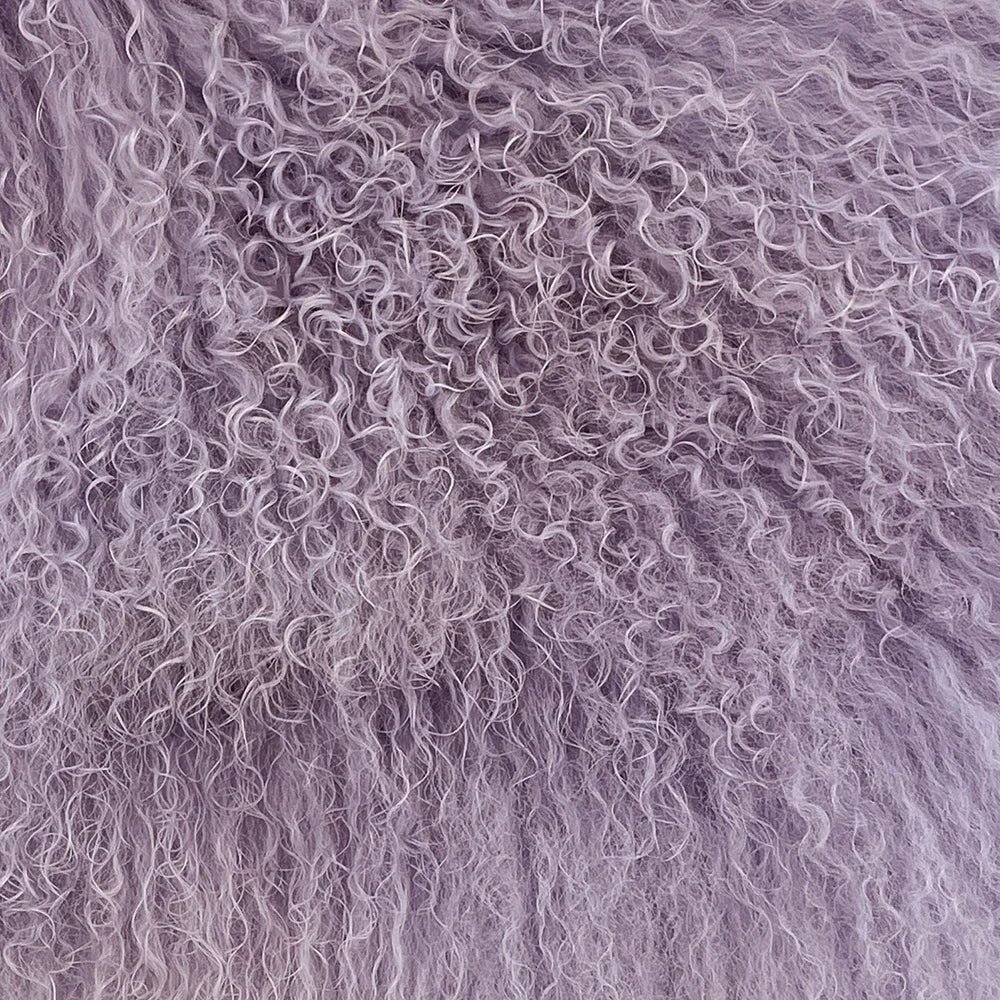 Close-up of curly purple hair texture