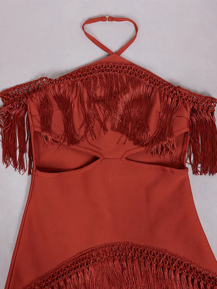 Red halter top with fringe details on a white background