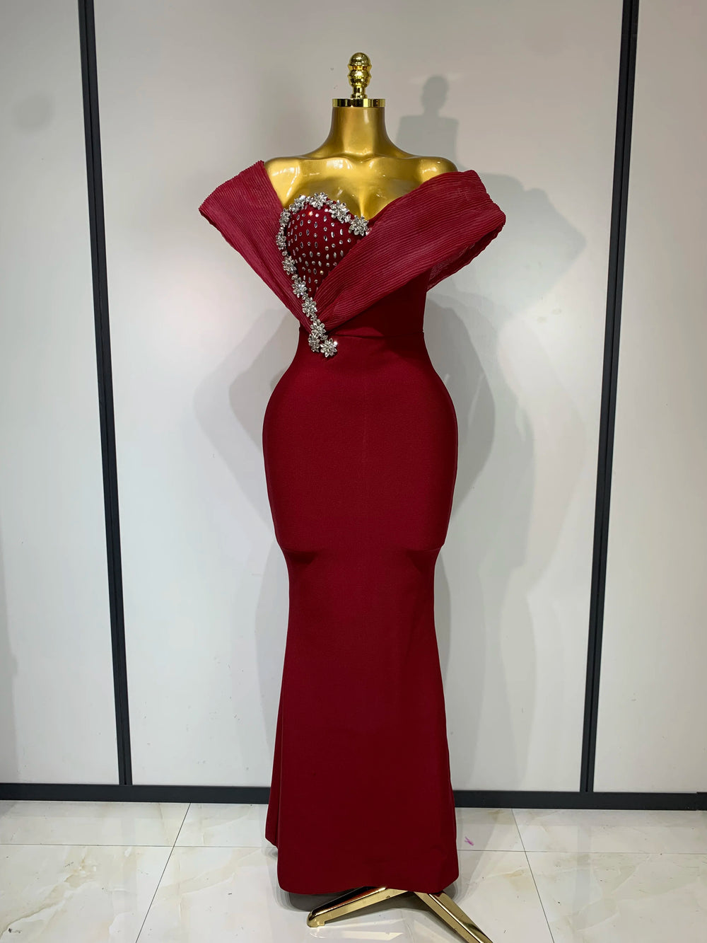 Burgundy one shoulder embellished neckline gown