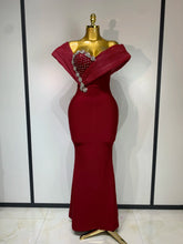 Burgundy one shoulder embellished neckline gown