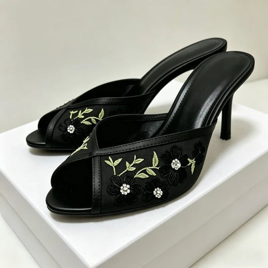 Black embroidered floral stiletto mules