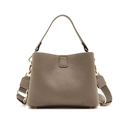 Gray handbag with a strap on a white background