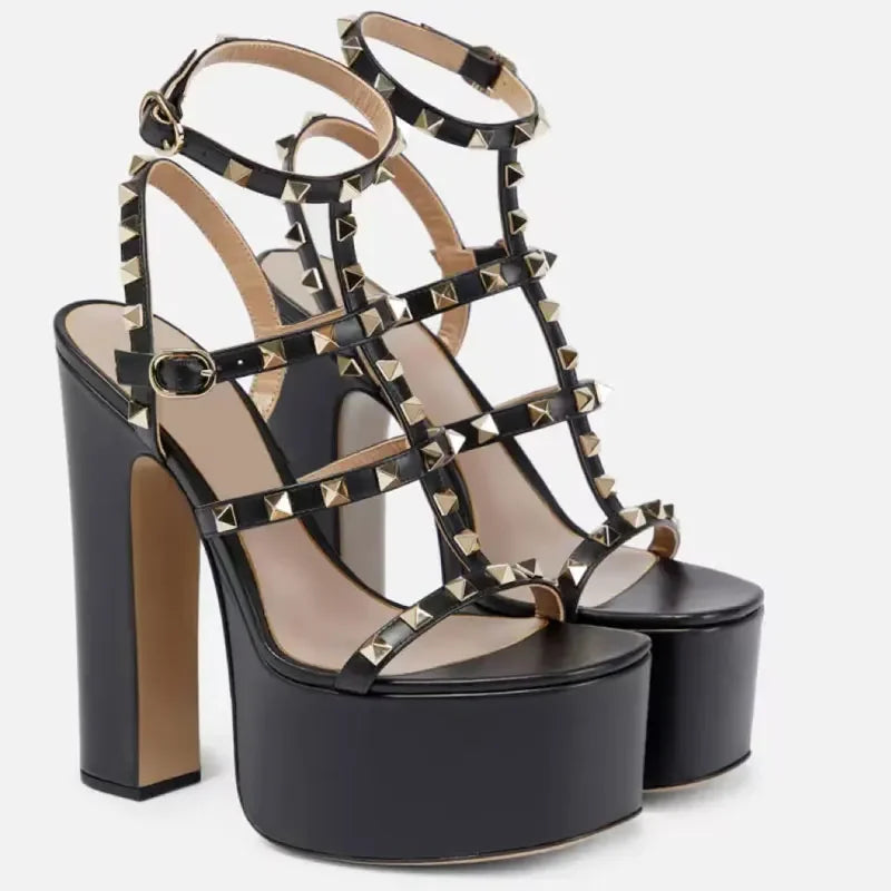 Black platform sandals with gold studs