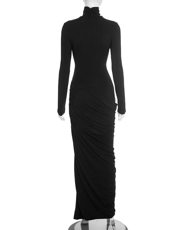 Black long-sleeve gown on a mannequin against a white background