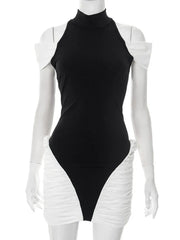 Black bodysuit with white ruffled sleeves on a mannequin against a white background