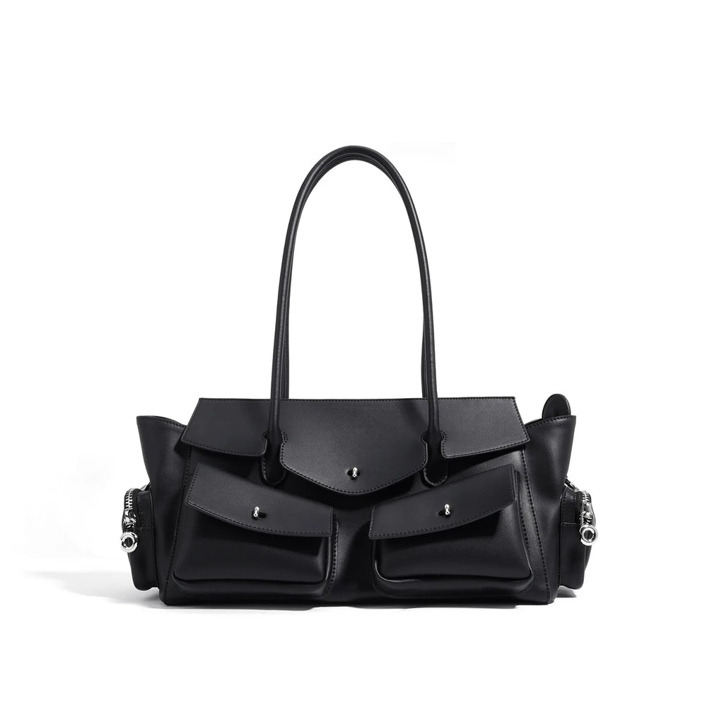 Black handbag with multiple pockets on a white background