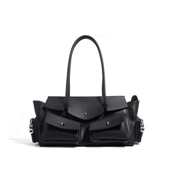 Black handbag with multiple pockets on a white background