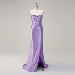 Lavender evening gown on a mannequin against a gray background