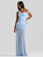 Woman wearing a light blue off-shoulder gown