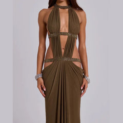 Olive green evening gown with cut-out design on a plain background