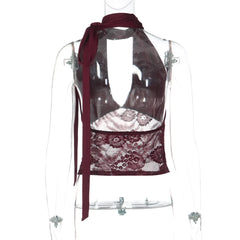 Clear apron with burgundy lace detailing on a mannequin against a white background