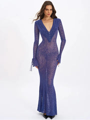 Slim blue sheath gown styled for evening events