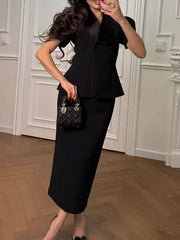 Tailored outfit featuring lapel top and sheath skirt for office styling