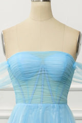 Light blue dress on a mannequin against a white background