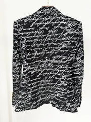 Back view of the love letter print double-breasted blazer.