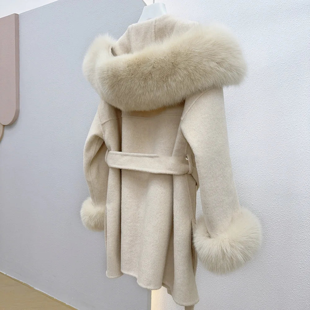 Beige coat with fur collar and cuffs on a white background