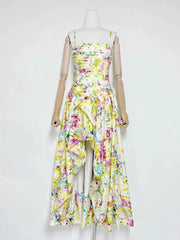 Floral dress on a mannequin against a white background