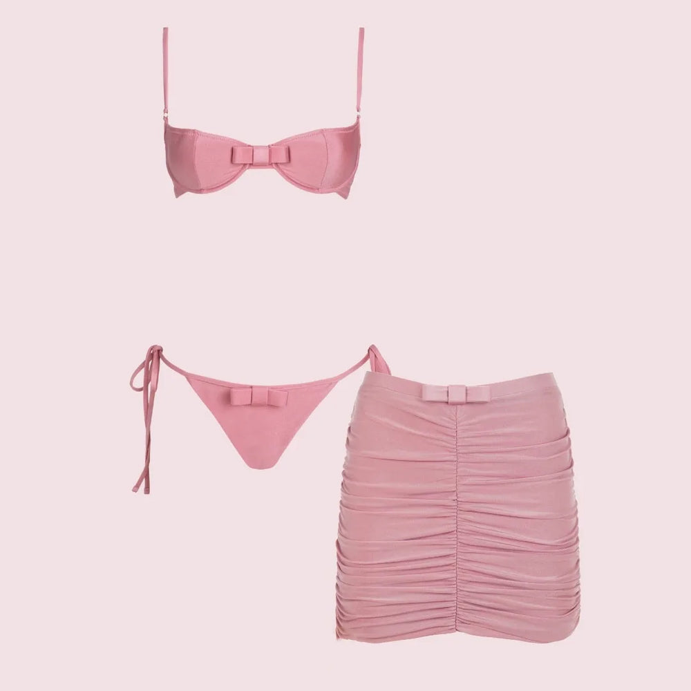 Pink bikini set with ruched mini skirt