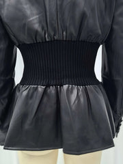 Black leather jacket with a ribbed waistband on a mannequin.