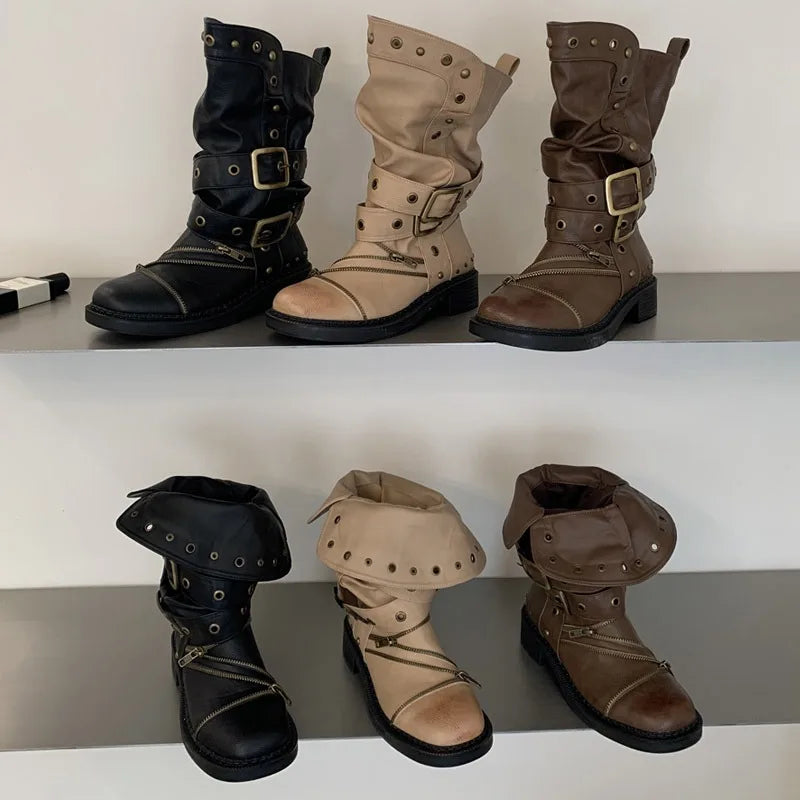 Assortment of colored studded ankle boots with buckle and zipper details