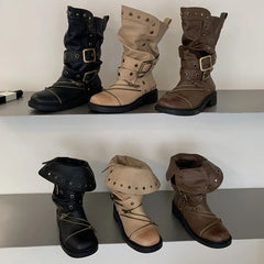Assortment of colored studded ankle boots with buckle and zipper details