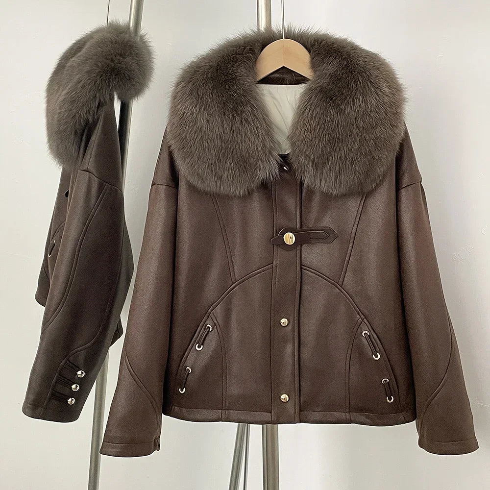 Brown leather jacket with fur collar on a hanger against a white background
