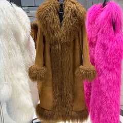 Brown fur coat with matching gloves and scarf displayed against a pink and white background.
