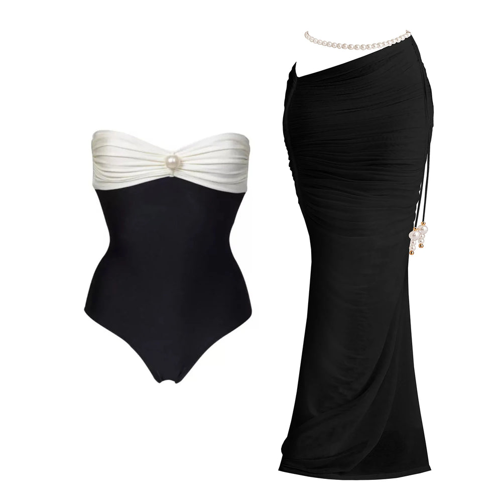 Black and white bandeau swimsuit with pearl detail and black ruched maxi skirt