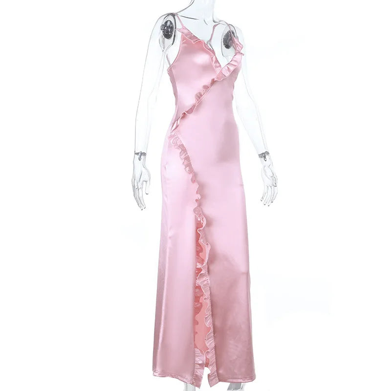 Pink satin nightgown on a mannequin against a white background