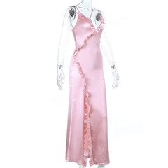 Pink satin nightgown on a mannequin against a white background